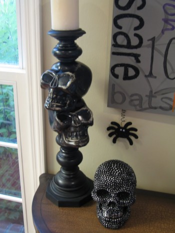 DIY skull candlesticks. Make this Halloween Decorations for only $5!